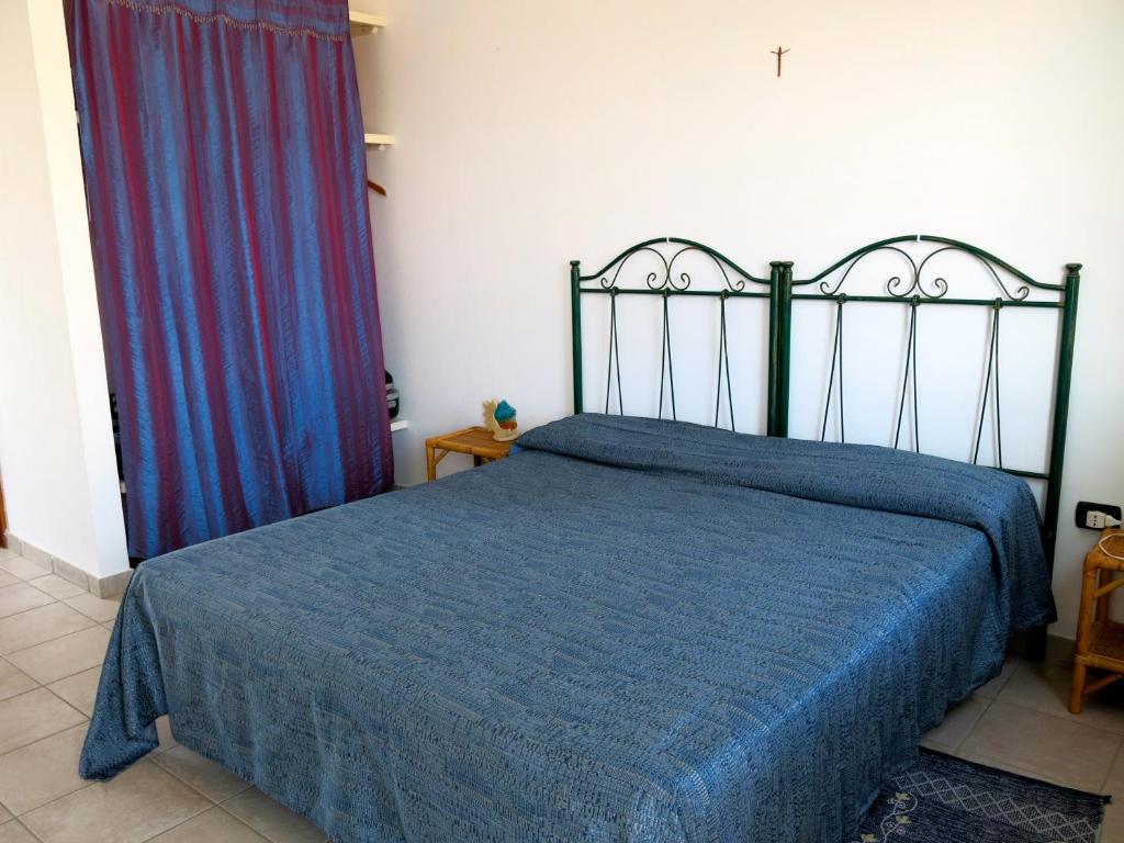 Posteľ alebo postele v izbe v ubytovaní Agriturismo Tenuta Del Morige