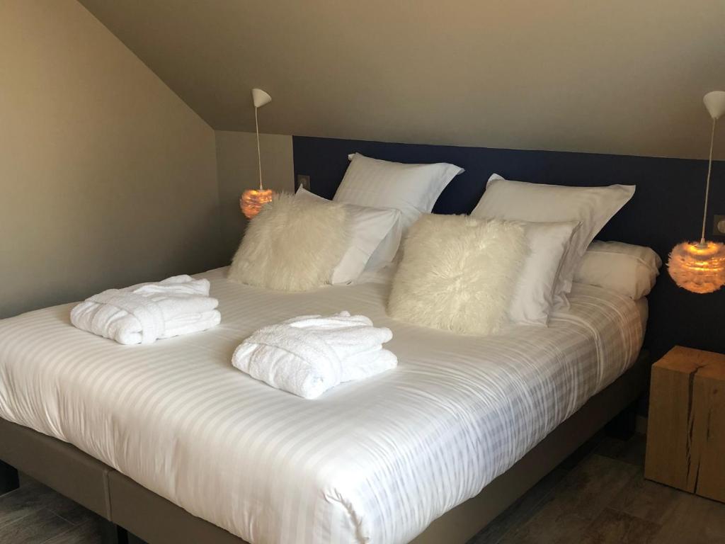 Postel nebo postele na pokoji v ubytování Gîte Wellness Le Six H