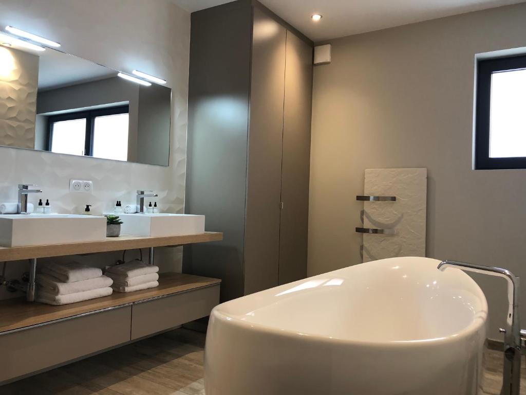 Koupelna v ubytování Gîte Wellness Le Six H