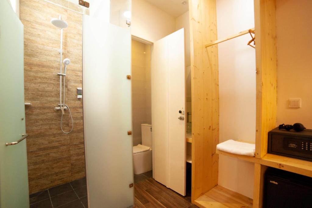 Koupelna v ubytování Portia Hotel & Spa