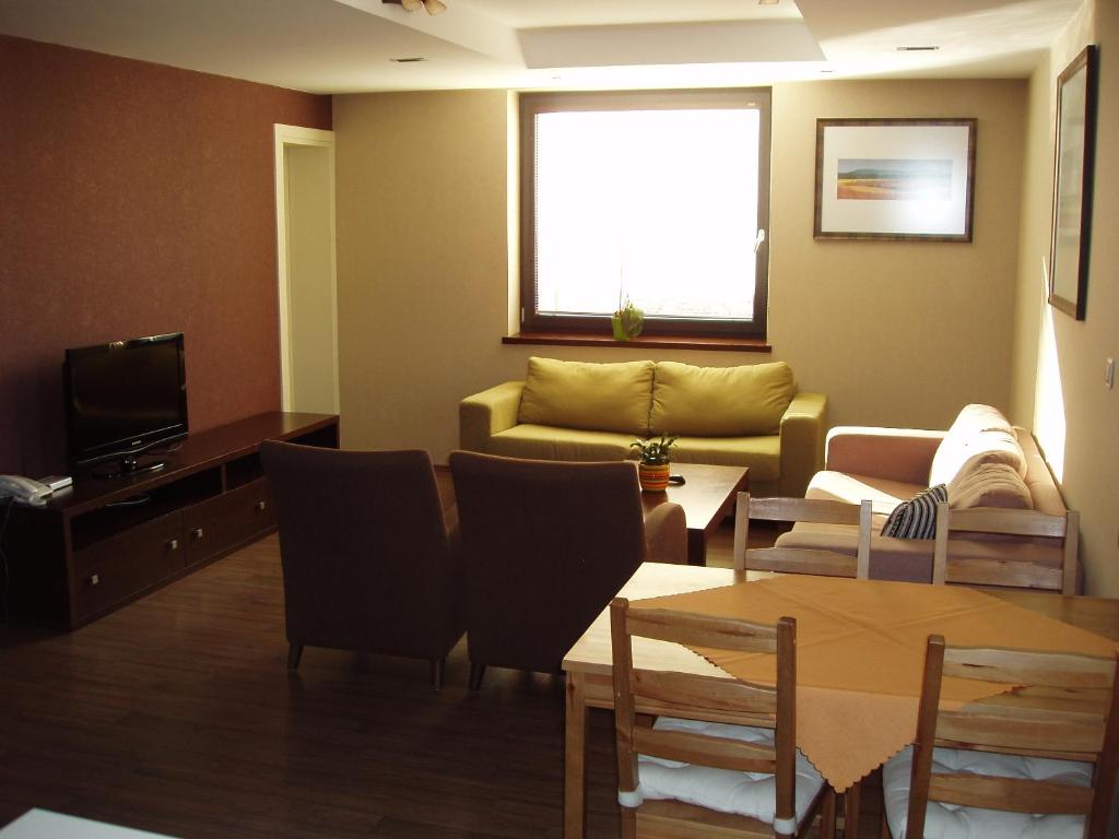 TV a/nebo společenská místnost v ubytování Hotel Predium