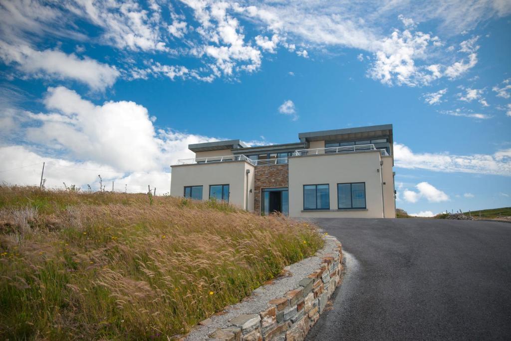 a house on the side of a road at Property 260 - Moyard in Moyard