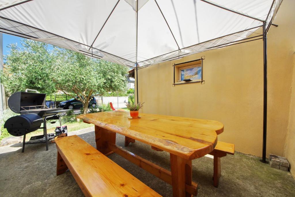 Posedenie v ubytovaní Apartman Olive Garden