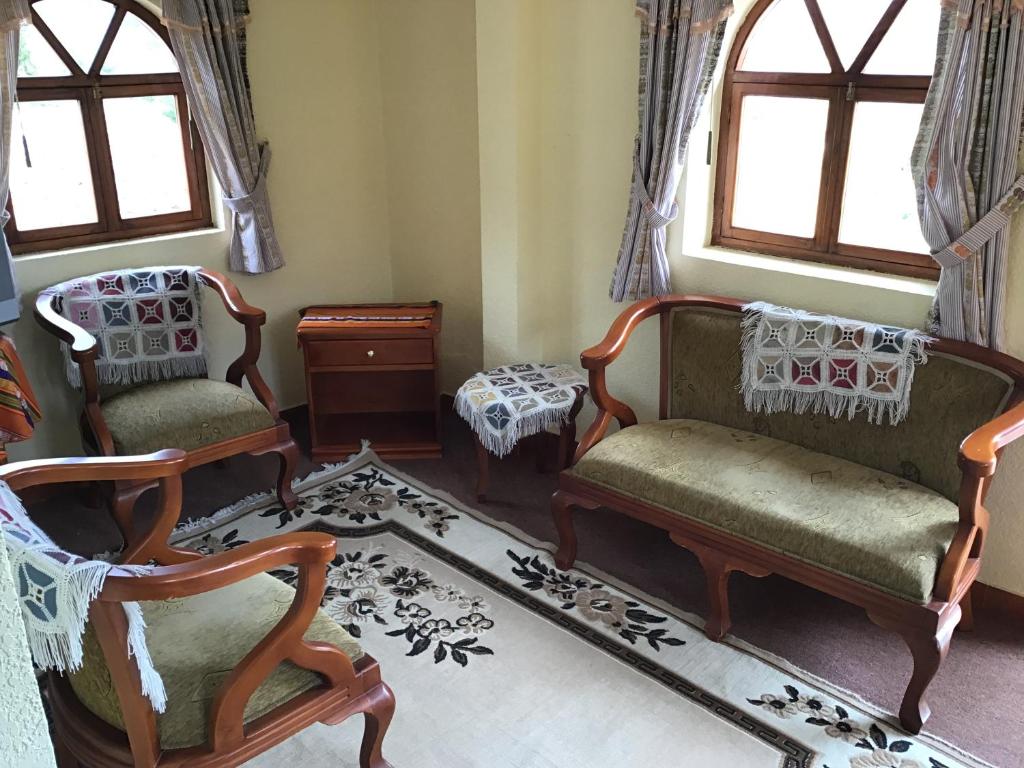 Posezení v ubytování Hostal Curiñan