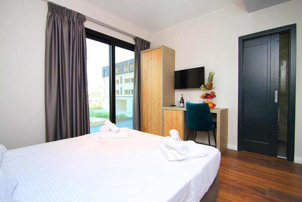 Postelja oz. postelje v sobi nastanitve A&G HOTEL