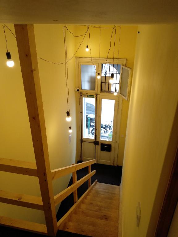 Postel nebo postele na pokoji v ubytování HoBar Hostel