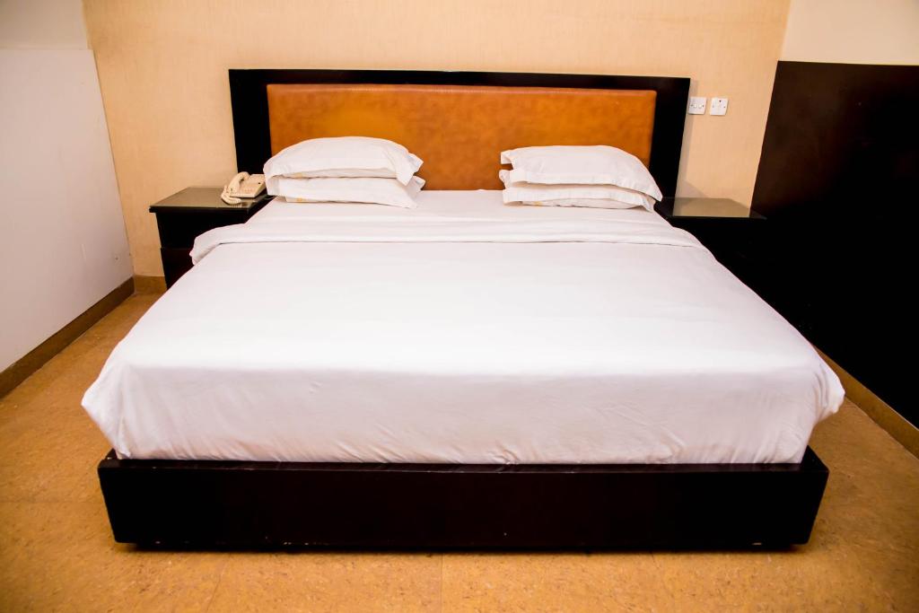 Postel nebo postele na pokoji v ubytování BW Starfire Hotel