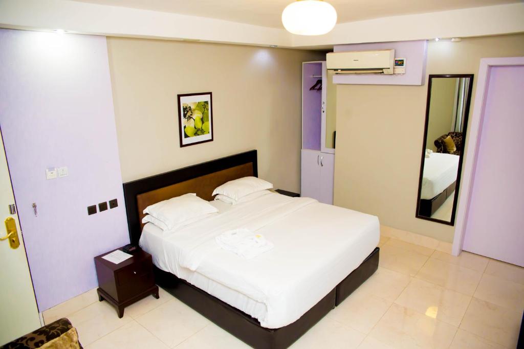 Postel nebo postele na pokoji v ubytování BW Starfire Hotel