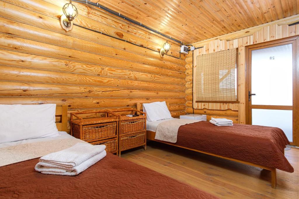Postel nebo postele na pokoji v ubytování AKVALIS комплекс для отдыха