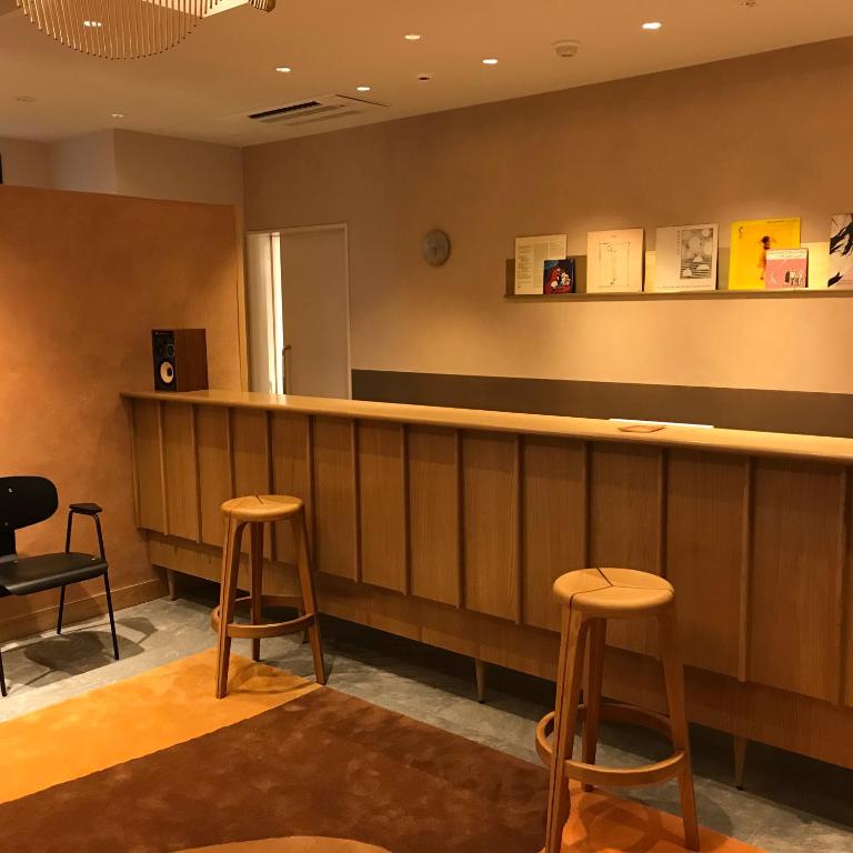 TV a/nebo společenská místnost v ubytování cinnamon hotel