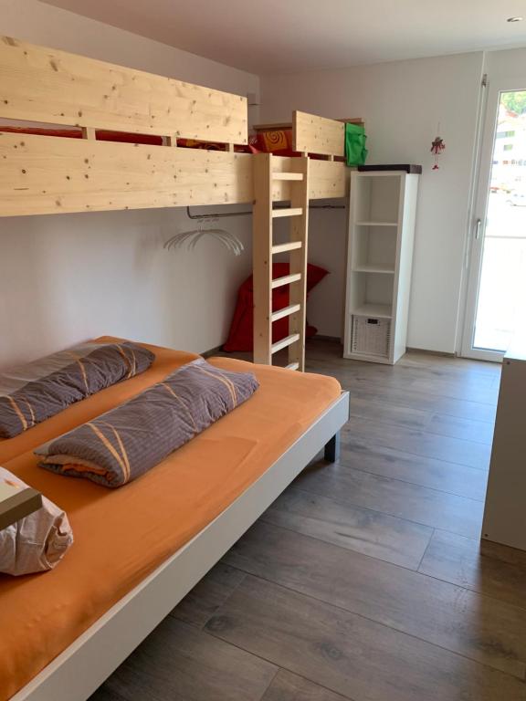 Postel nebo postele na pokoji v ubytování Haus Baracca