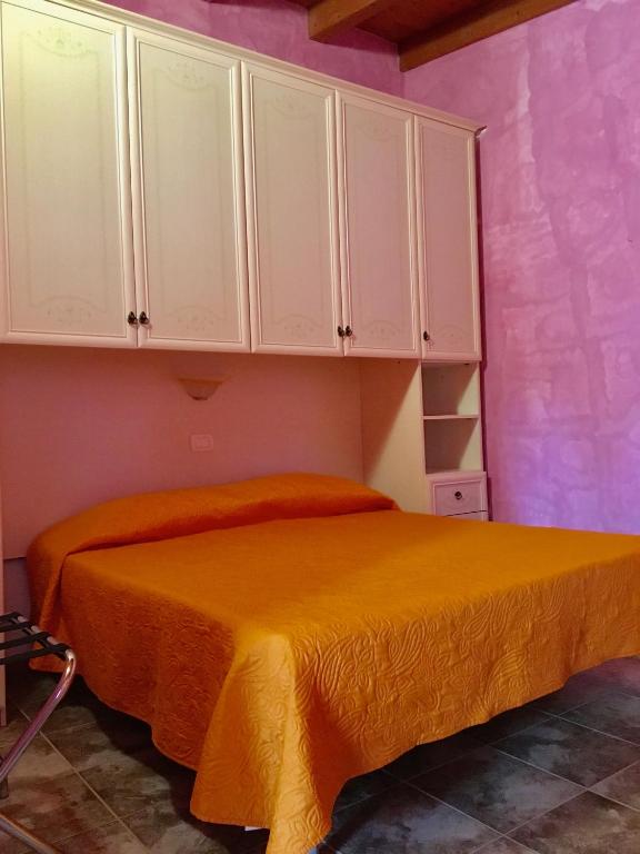 Postel nebo postele na pokoji v ubytování B&B Villa Carla