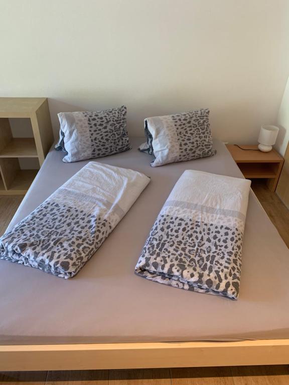 Postel nebo postele na pokoji v ubytování Haus Baracca