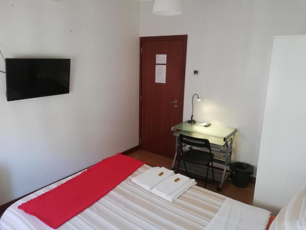 TV a/nebo společenská místnost v ubytování MicroRent Rooms