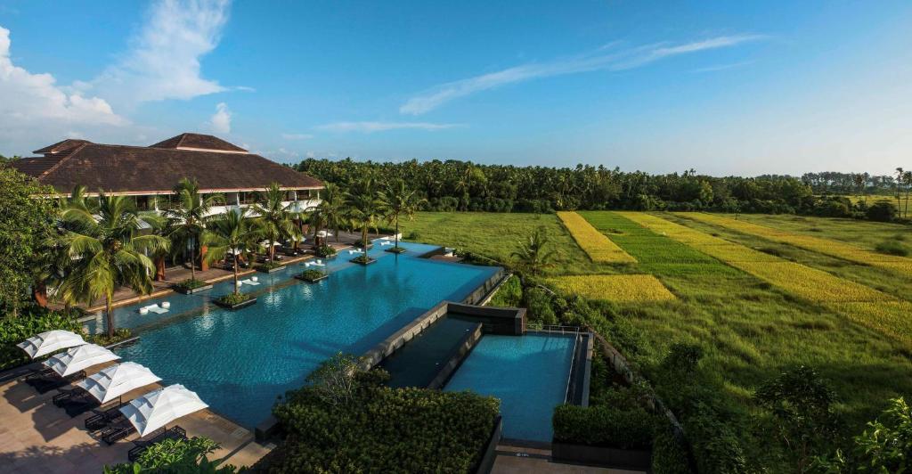 an aerial view of a resort with a swimming pool at Alila Diwa Goa - A Hyatt Brand in Majorda