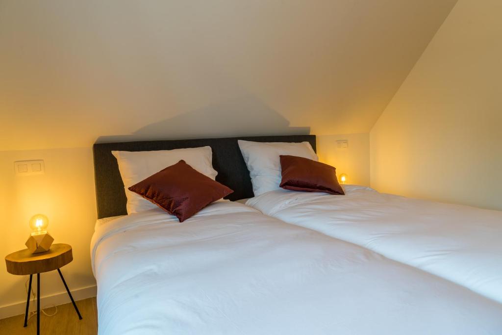 Postel nebo postele na pokoji v ubytování Hotel Huron