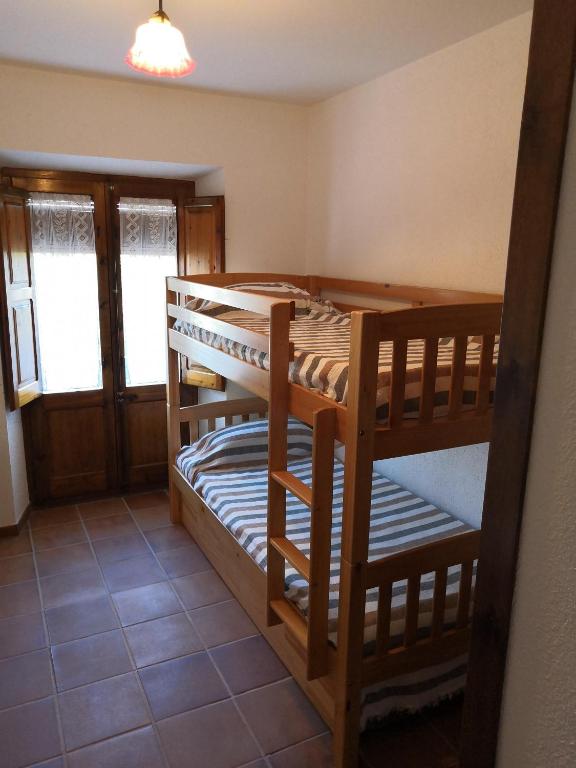 Postel nebo postele na pokoji v ubytování Cal Nicet