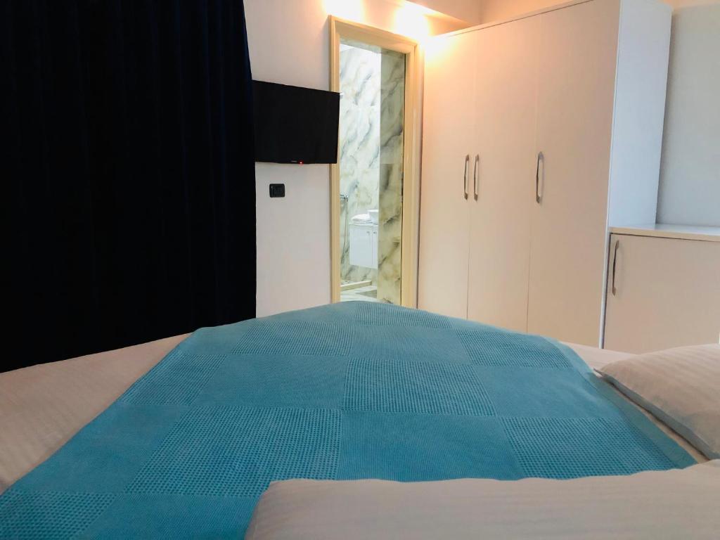 Postel nebo postele na pokoji v ubytování Envi Hotel