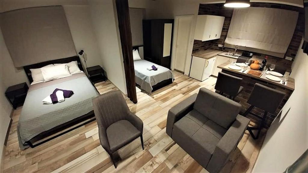 Kuchyň nebo kuchyňský kout v ubytování Perneia Rooms