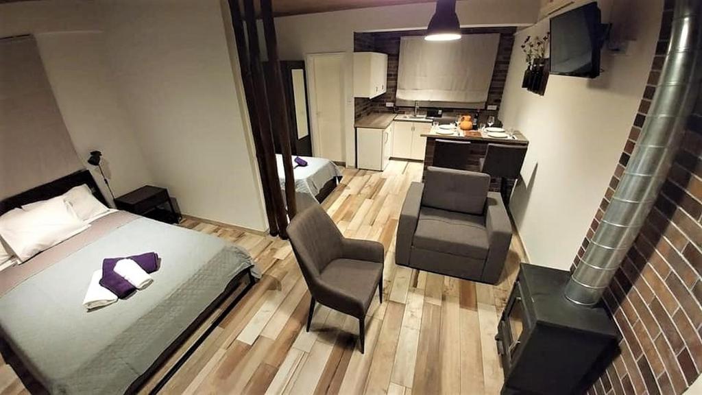 Postel nebo postele na pokoji v ubytování Perneia Rooms