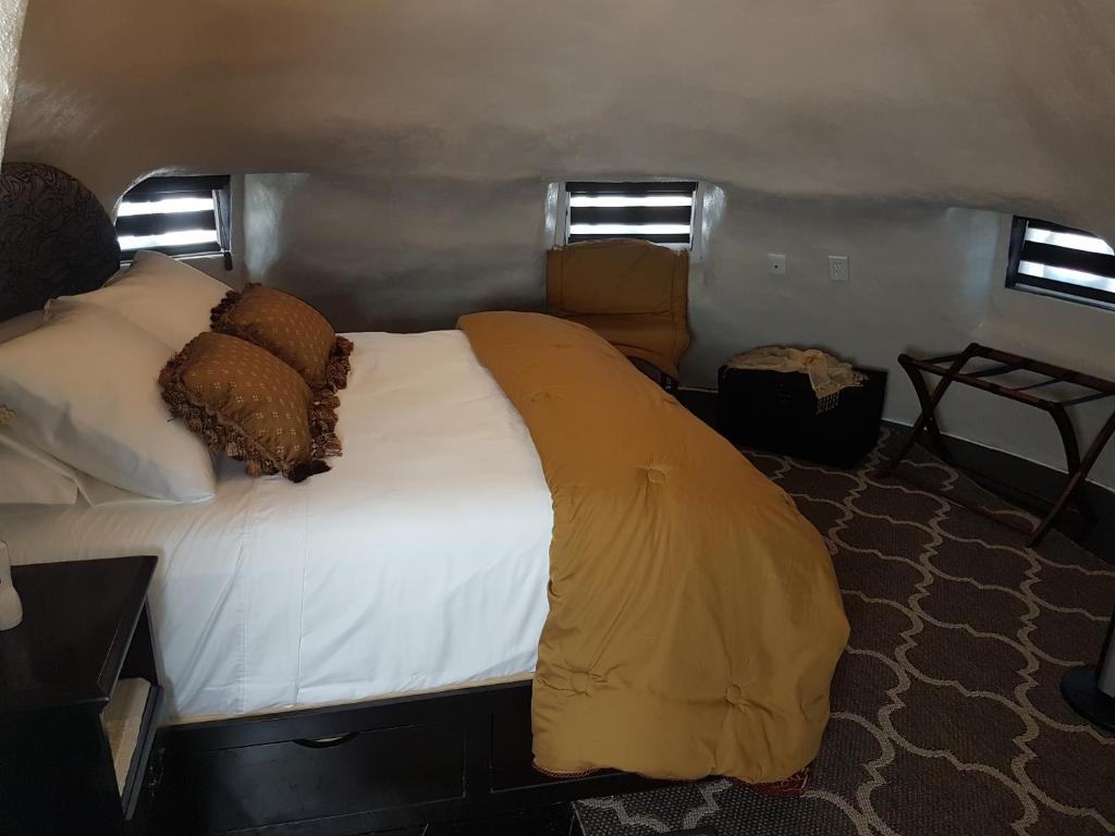 Postel nebo postele na pokoji v ubytování Hacienda Eco-Domes