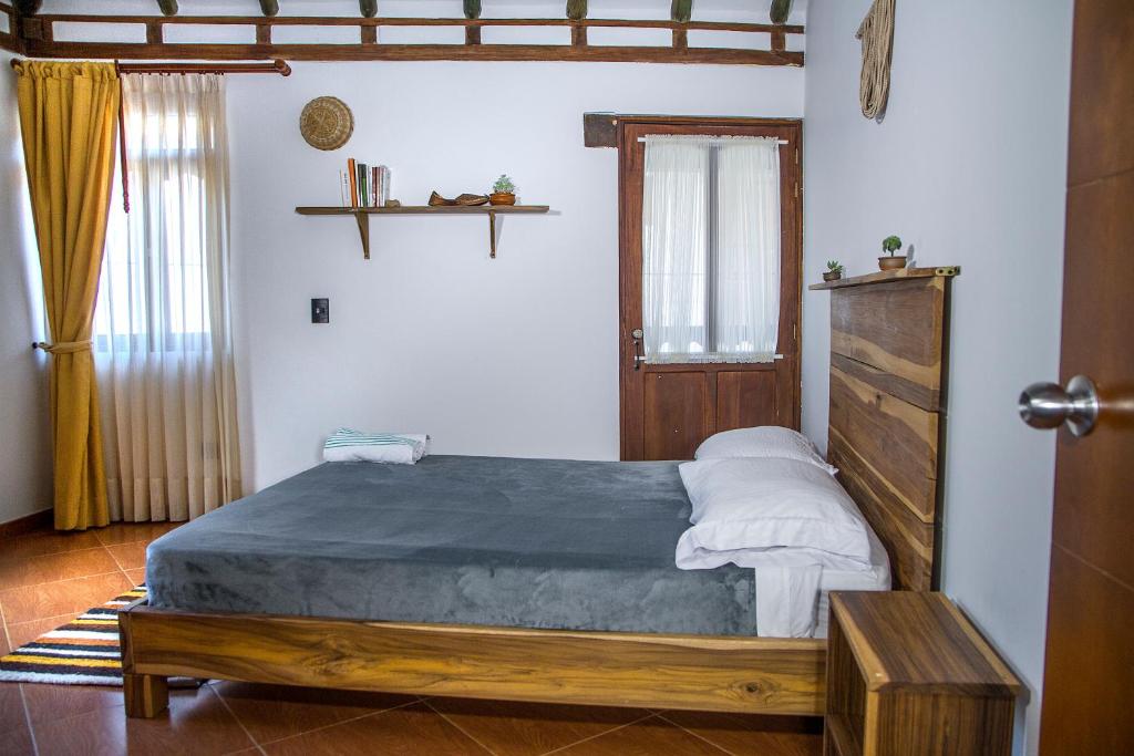 Voodi või voodid majutusasutuse Nibiru Hostel toas