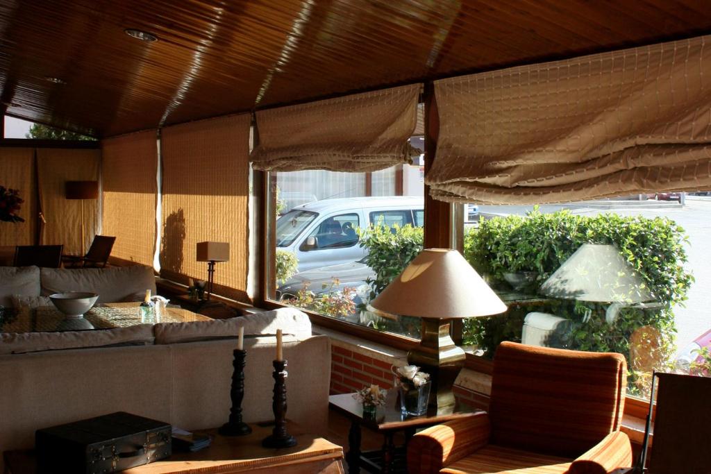 Posezení v ubytování Hotel Fidalgo
