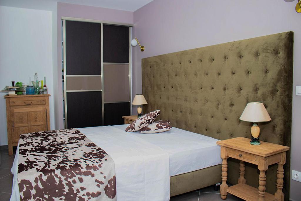 Postel nebo postele na pokoji v ubytování Aparthotel Palace