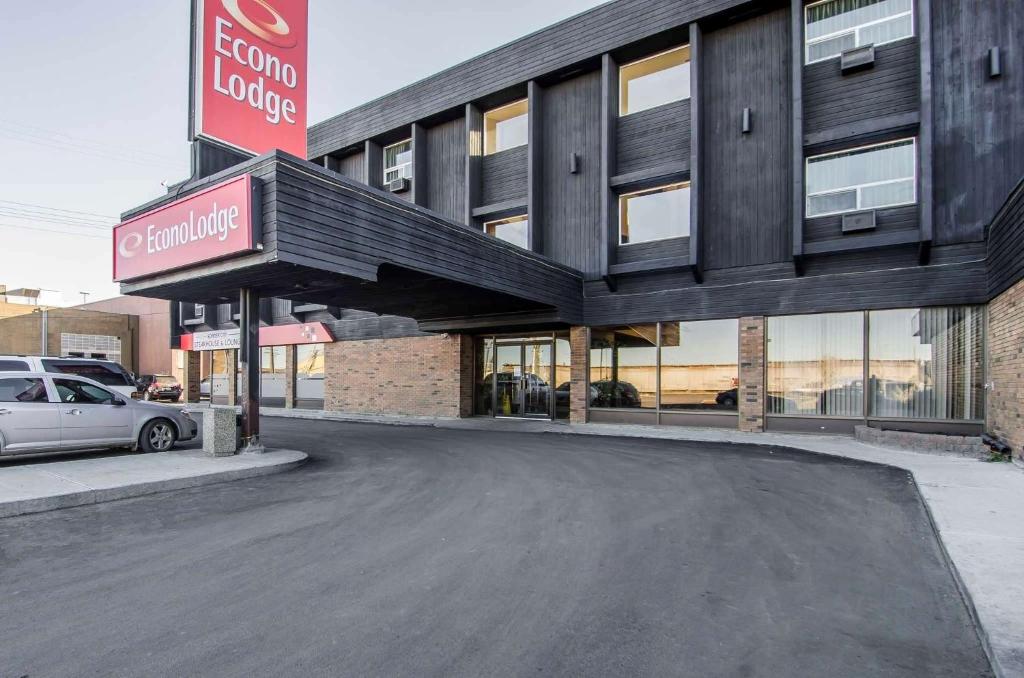 a parking lot in front of a building at Econo Lodge Lloydminster in Lloydminster