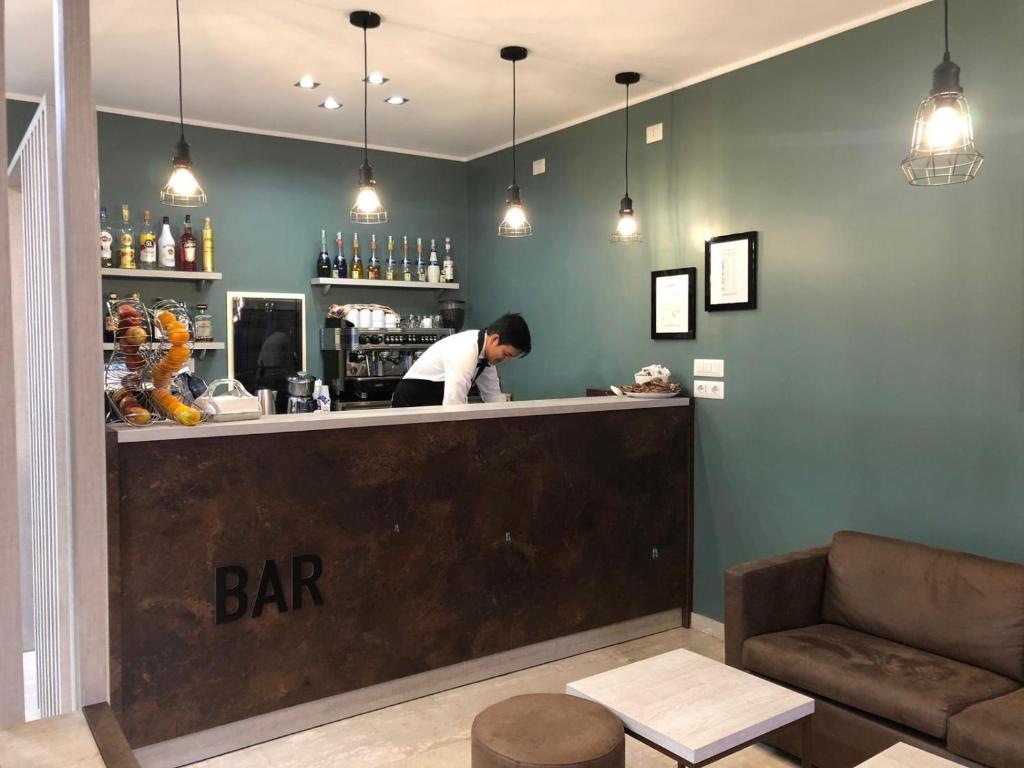De lounge of bar bij Oasi Village Hotel