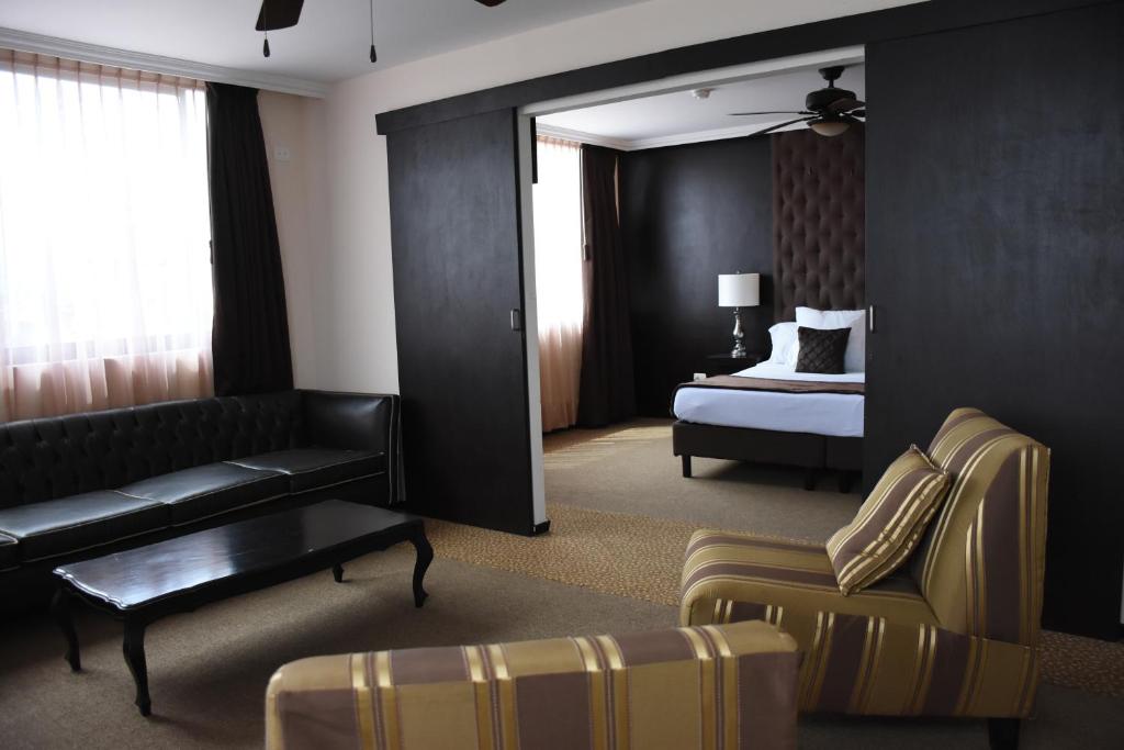 Postel nebo postele na pokoji v ubytování Hotel Clara Luna