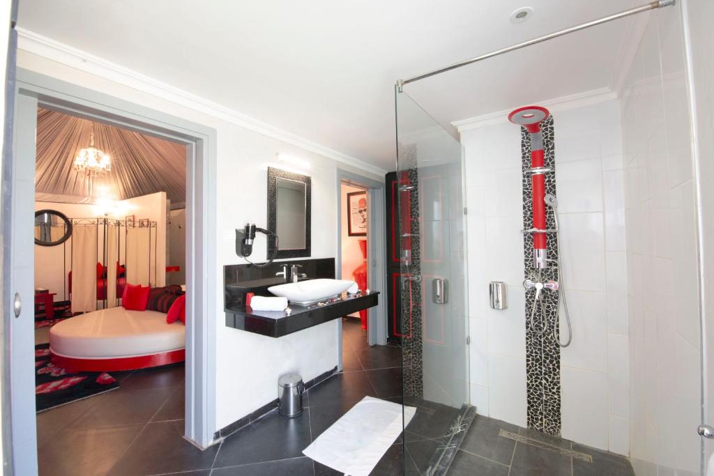 Postel nebo postele na pokoji v ubytování Eden Lodges & SPA