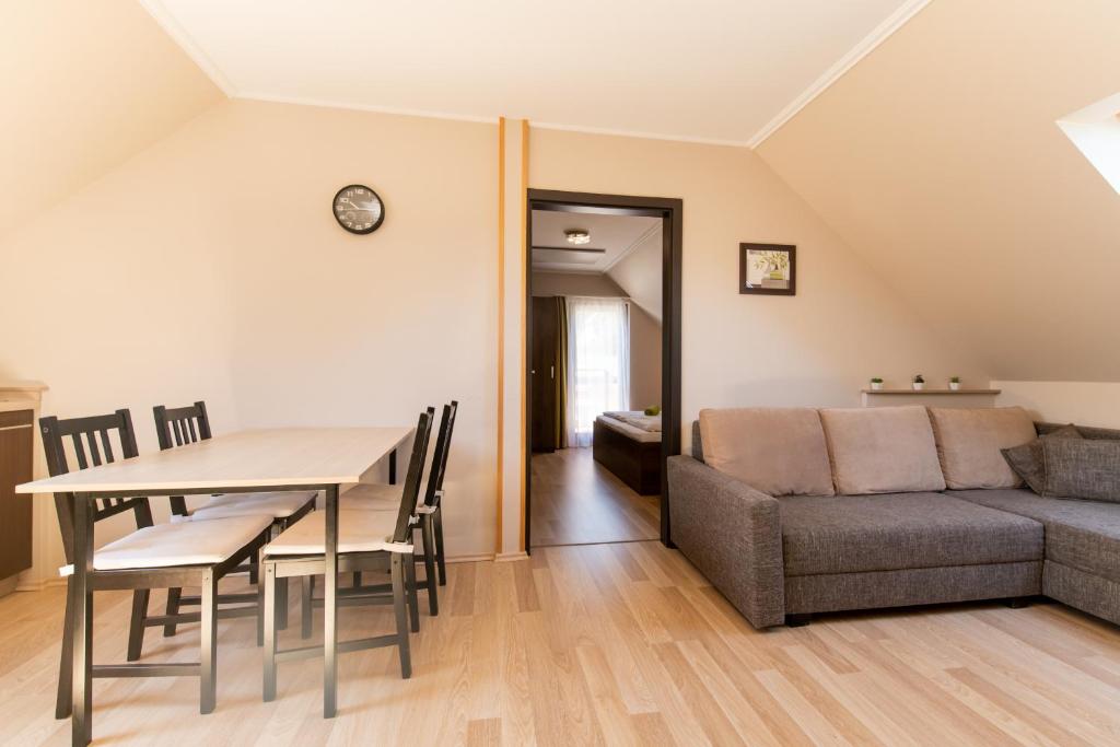 Posezení v ubytování Dunazug Apartmanház