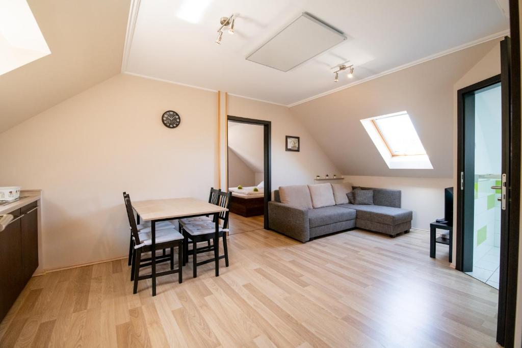 Posezení v ubytování Dunazug Apartmanház