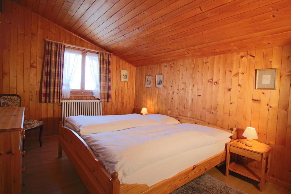 Postel nebo postele na pokoji v ubytování Pension Les Audannes