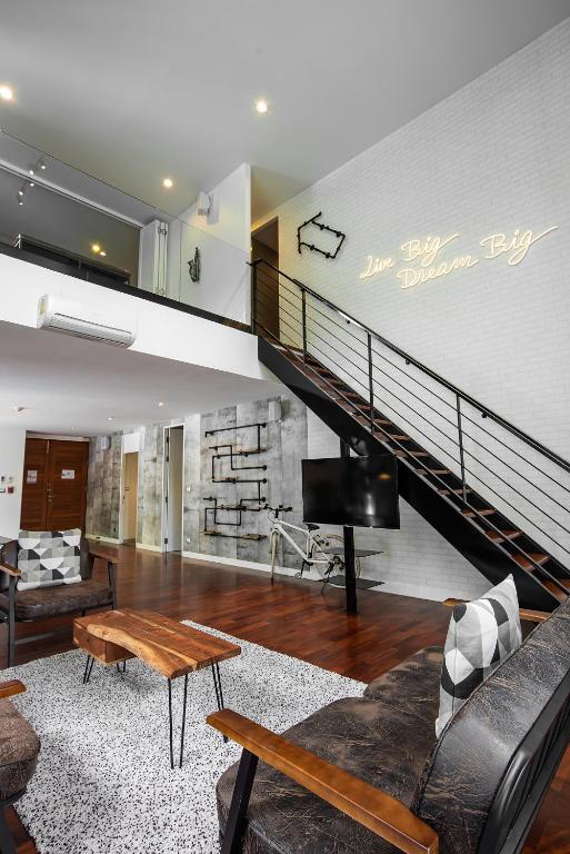 Posezení v ubytování Benviar Tonson Residence