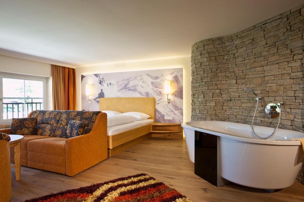Postel nebo postele na pokoji v ubytování Hotel Bräurup