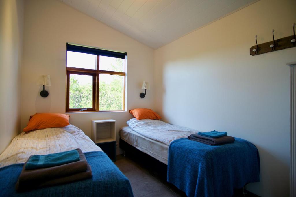 Katil atau katil-katil dalam bilik di Harpa Holiday Home - Birta Rentals