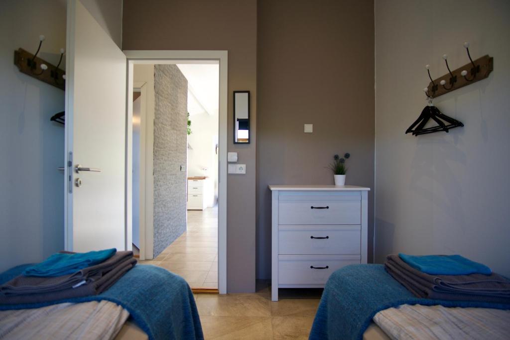 Katil atau katil-katil dalam bilik di Harpa Holiday Home - Birta Rentals