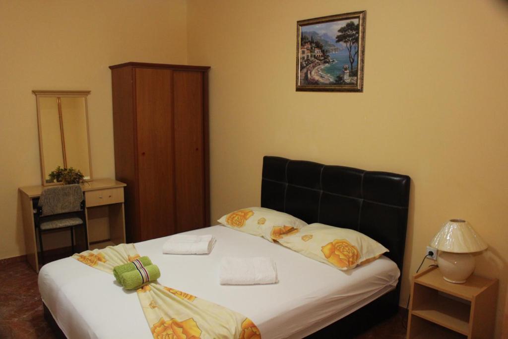 Postel nebo postele na pokoji v ubytování Casa Hena