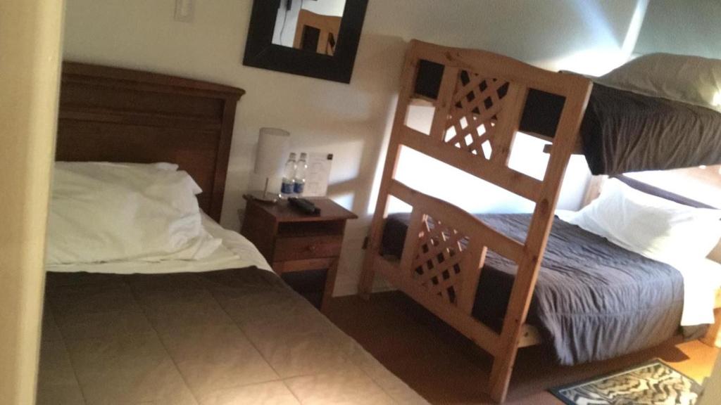 Postel nebo postele na pokoji v ubytování Hotel HF