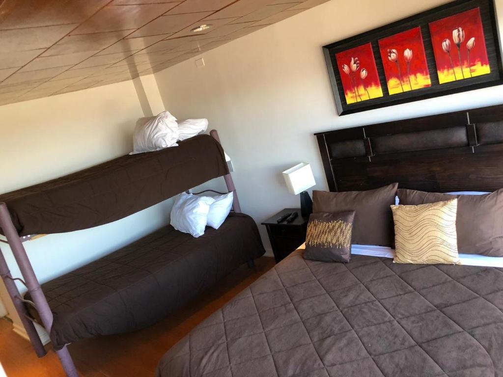Postel nebo postele na pokoji v ubytování Hotel HF