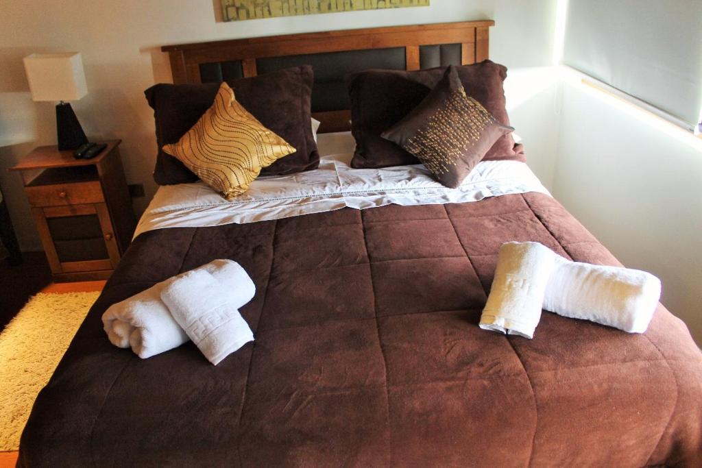 Postel nebo postele na pokoji v ubytování Hotel HF