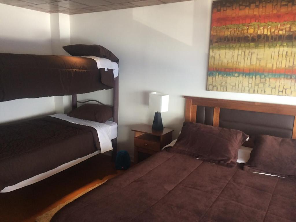Postel nebo postele na pokoji v ubytování Hotel HF