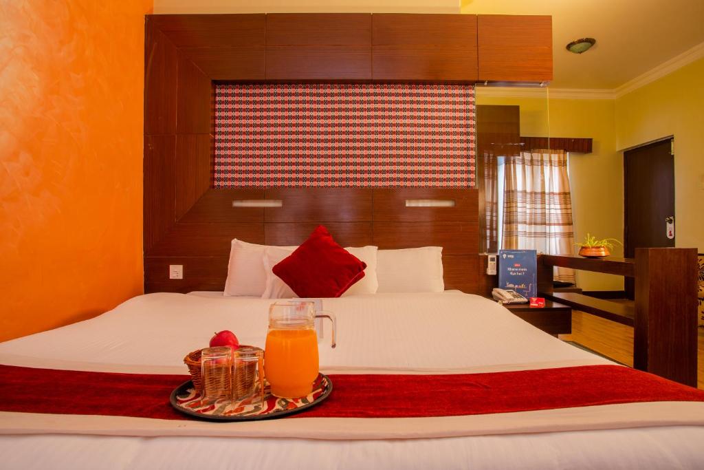 Llit o llits en una habitació de Hotel Snowland