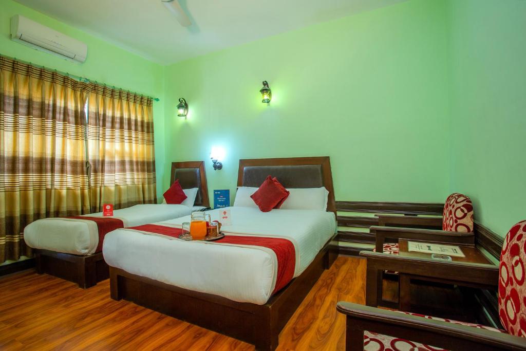 Llit o llits en una habitació de Hotel Snowland