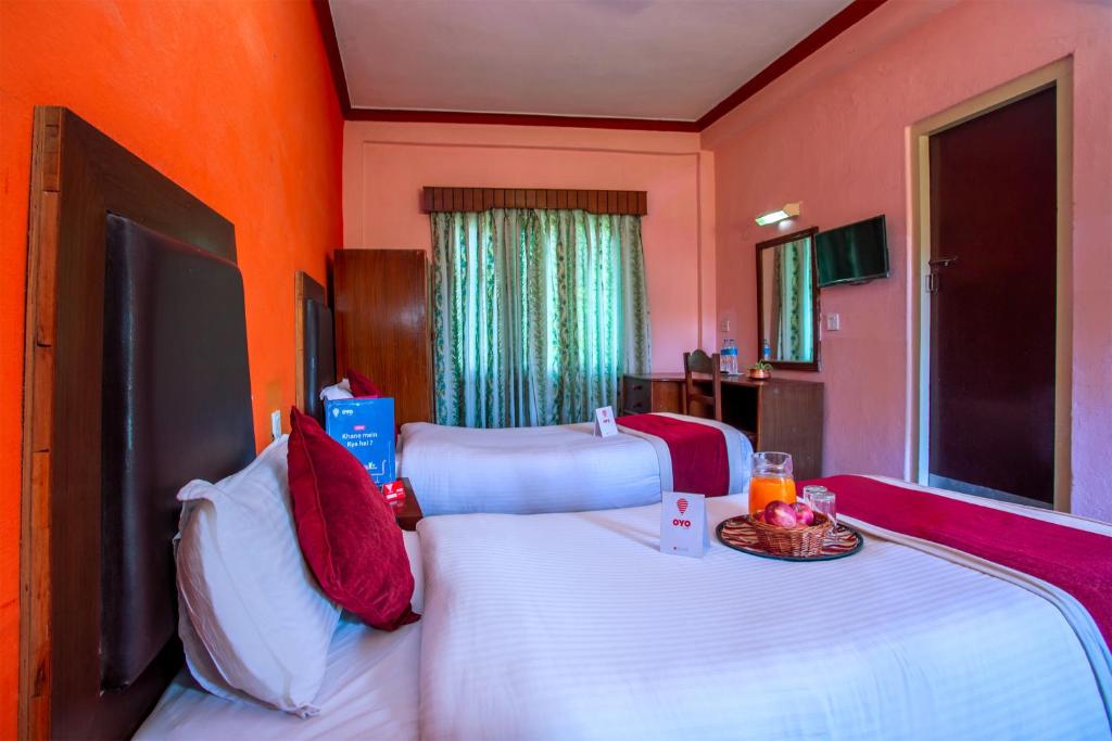 Llit o llits en una habitació de Hotel Snowland