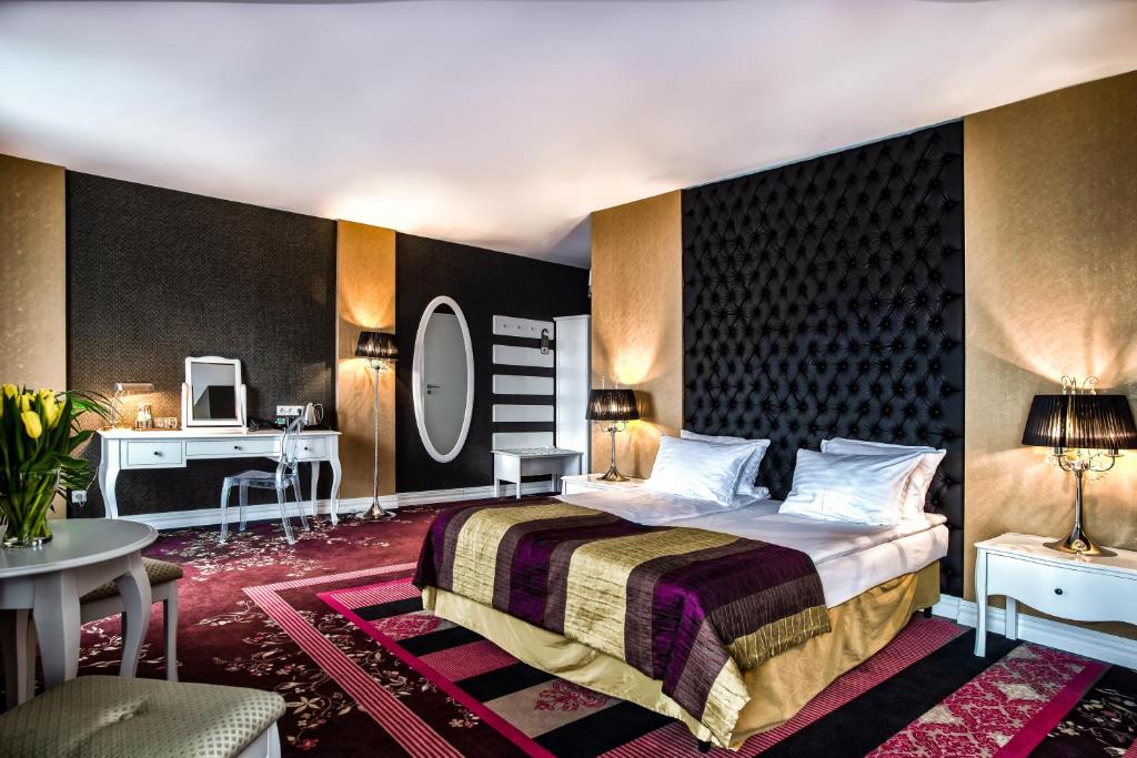 Postel nebo postele na pokoji v ubytování Hotel Lamberton