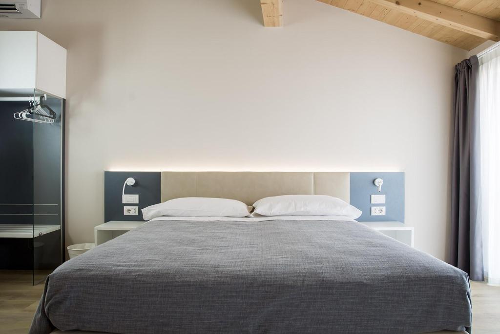 Postel nebo postele na pokoji v ubytování Casa Beccherie