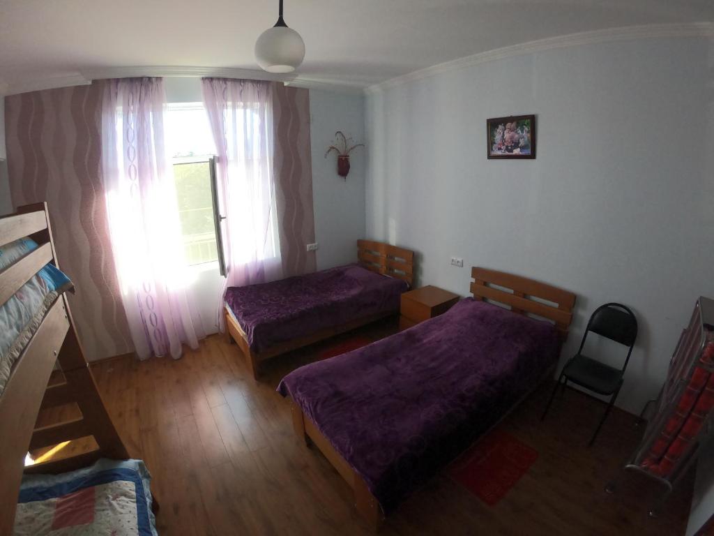 Postel nebo postele na pokoji v ubytování Green Tianeti